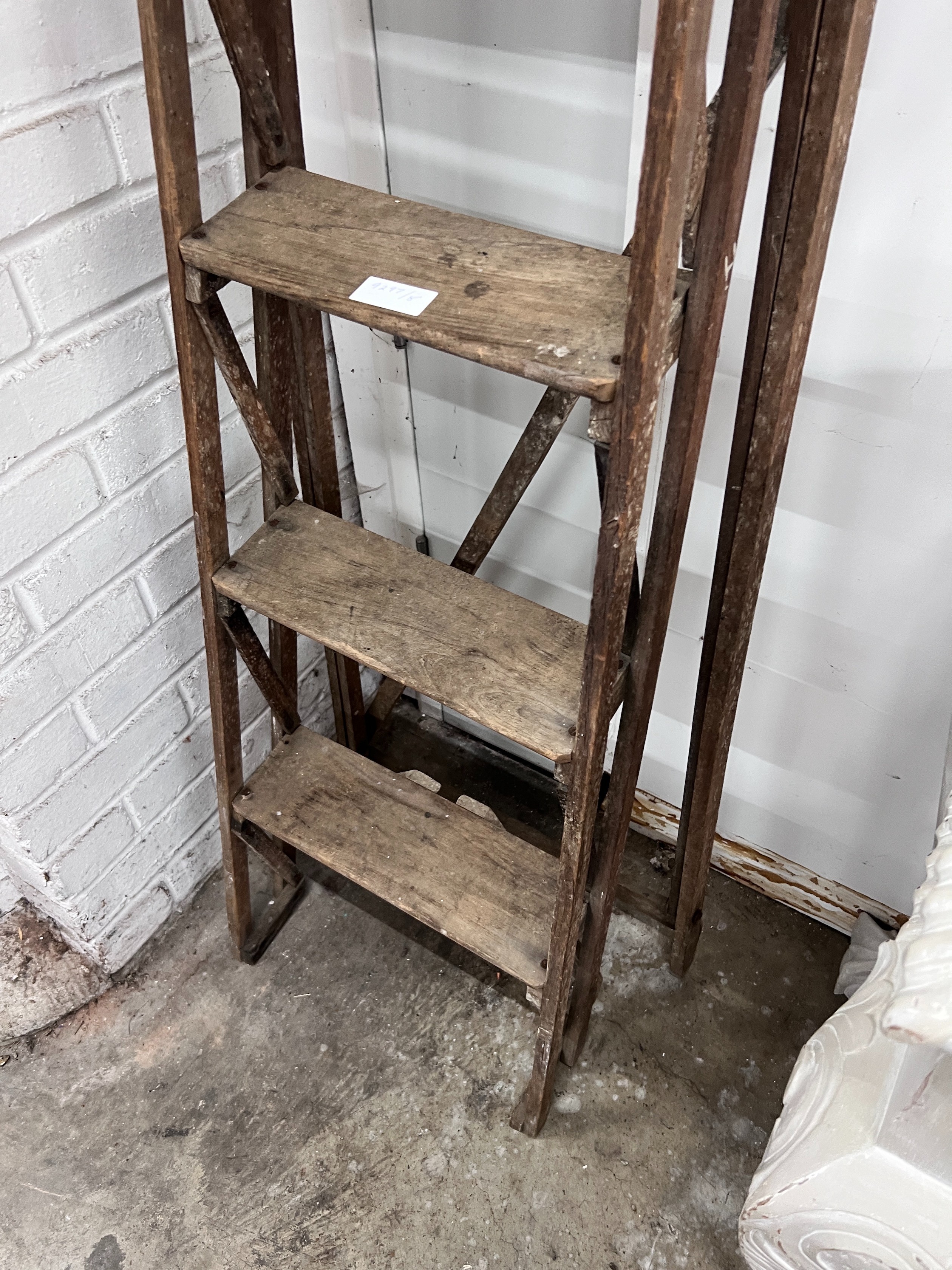 A vintage pine six tread step ladder, height 183cm *Please note the sale commences at 9am.